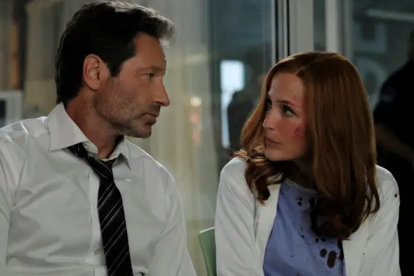 Man and woman in a serious conversation.