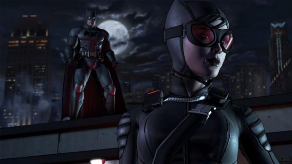 Catwoman and Batman on a rooftop.