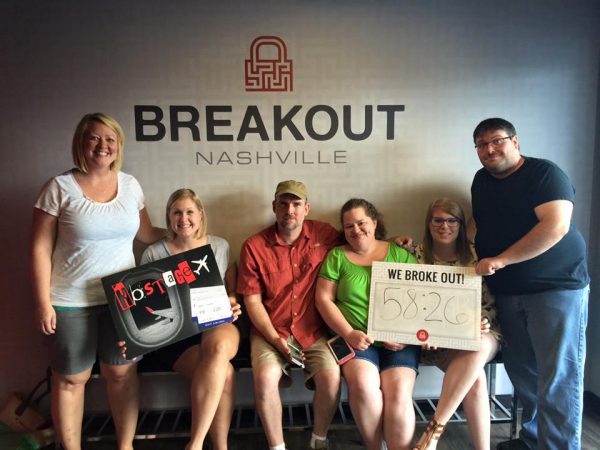 Group of friends pose at Breakout Nashville.