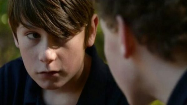 Close-up portrait of a young boy.