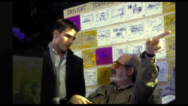 Tom Cruise and Steven Spielberg reviewing storyboards.