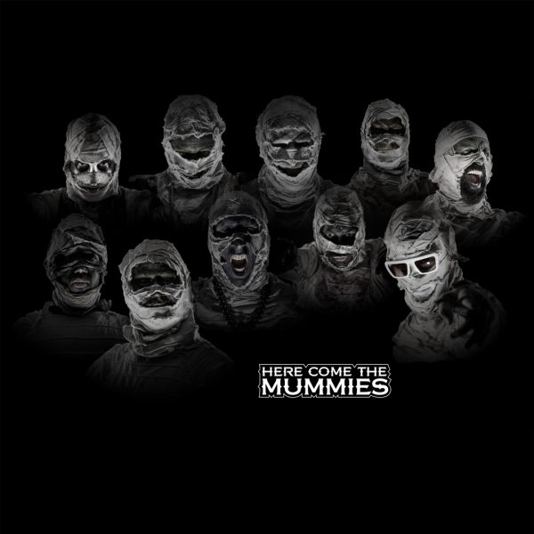 Group of mummies in black and white.