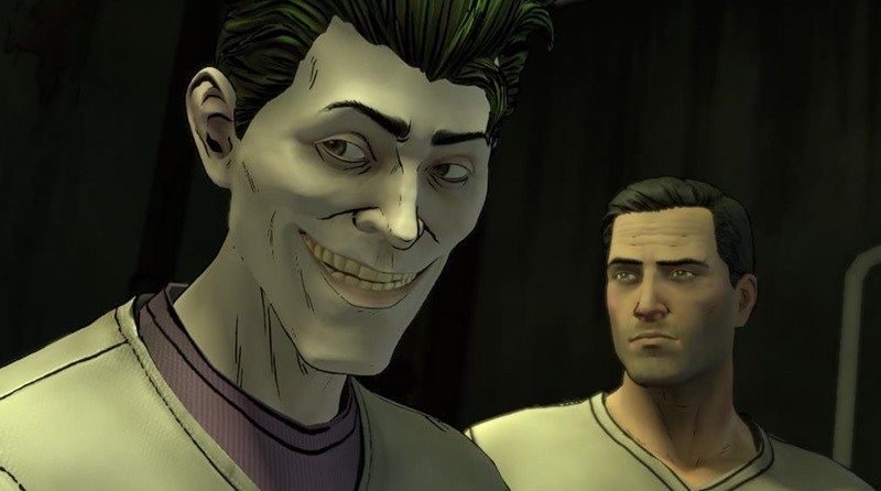 The Joker smiles menacingly at a man.