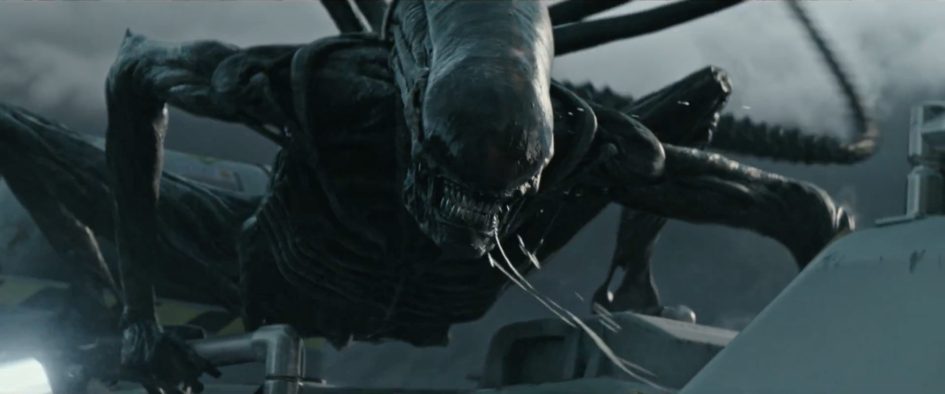 Xenomorph alien creature crawling on a ship.