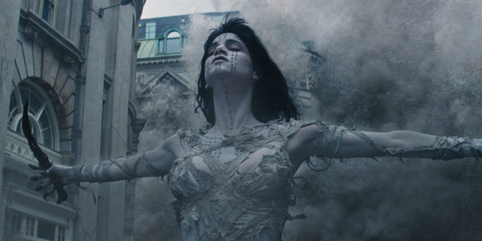 Mummy woman rises from the dust.