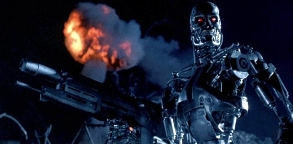 The Terminator holding a gun with red eyes.