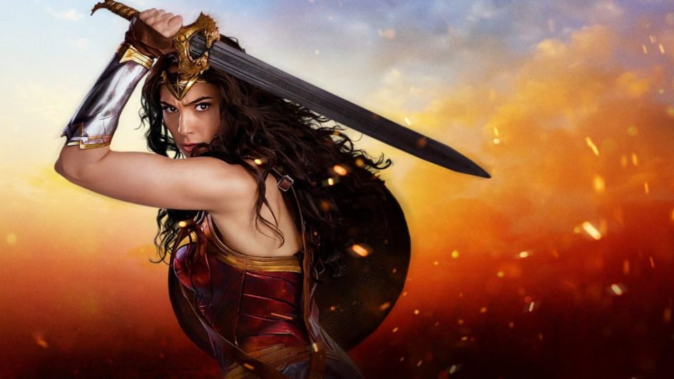 Wonder Woman wielding a sword in battle.