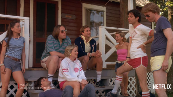 Group of friends on cabin porch