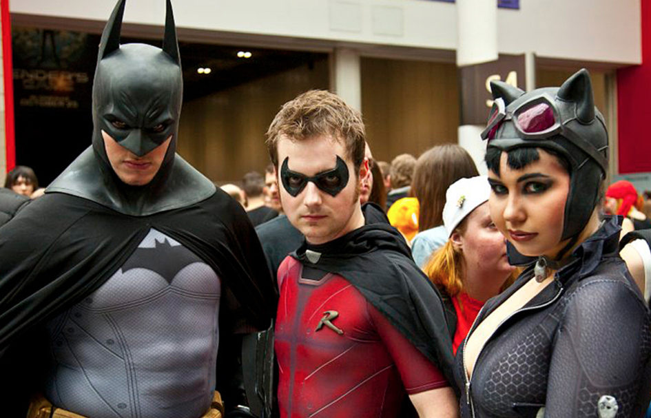 Batman, Robin, and Catwoman cosplay.