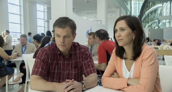 Man and woman sitting at a table.