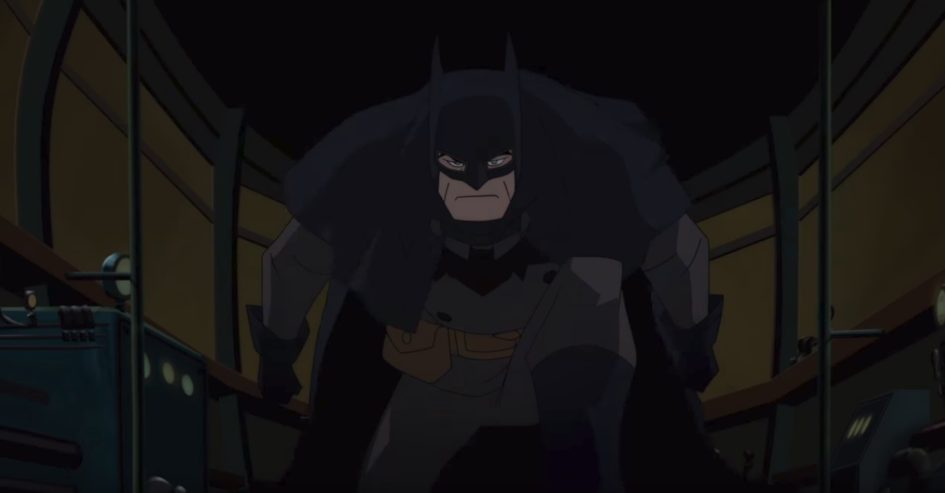 Batman in a dark, industrial setting.