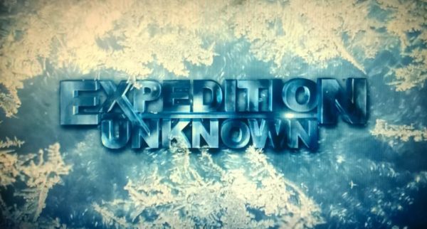 Expedition Unknown logo on blue background.