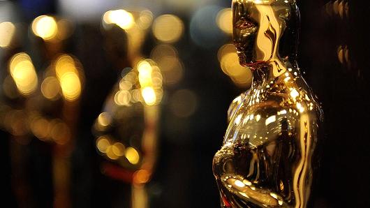 Golden statuette award in focus