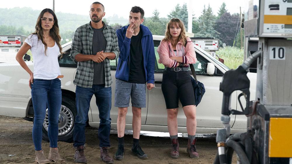 Jordana Brewster, Jesse Williams, Jay Baruchel, and Niamh Wilson stand in beside their car looking off camera